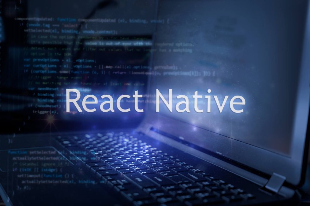 React Native כיתוב כנגד מחשב נייד וקוד